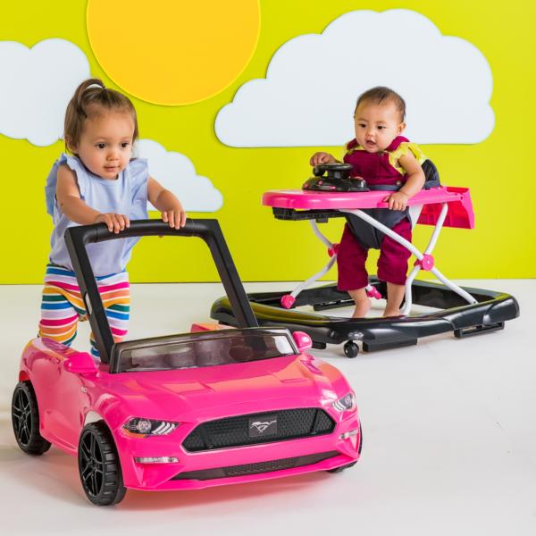 two kids with car toys