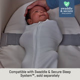 Ingenuity Snooze & Stow Easy-Folding Bassinet with Sound, Light & Vibration - Sand