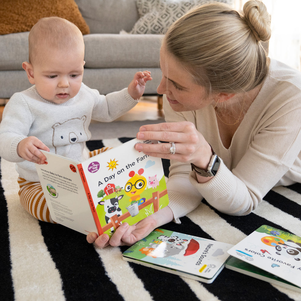 mom and baby reading