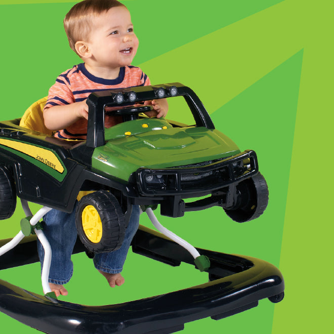 baby in john deere rocker