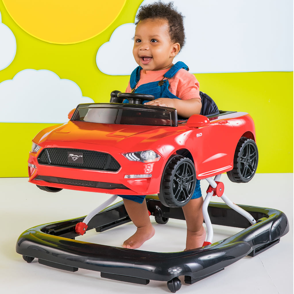 baby boy in ford mustang walker