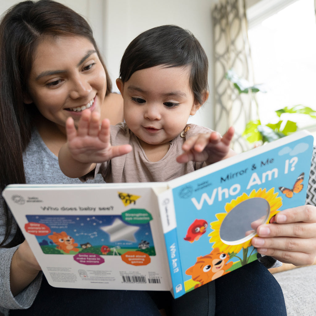 mom and baby reading