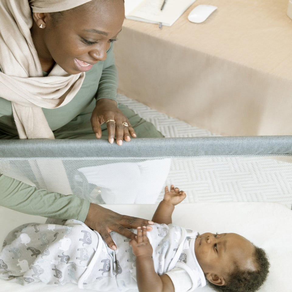 mother looking at her baby