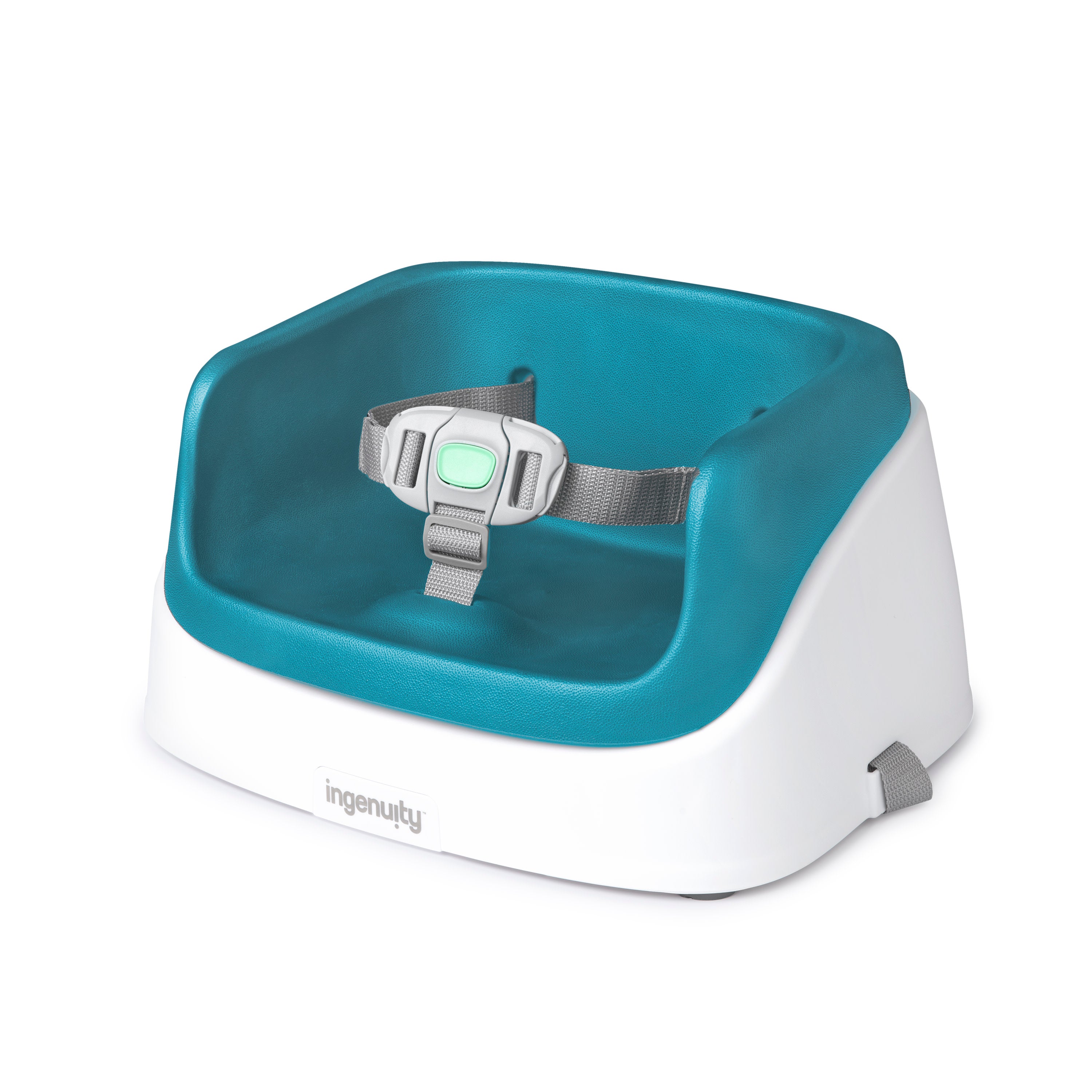 Ingenuity SmartClean Toddler Booster Seat strapped to a dining chair